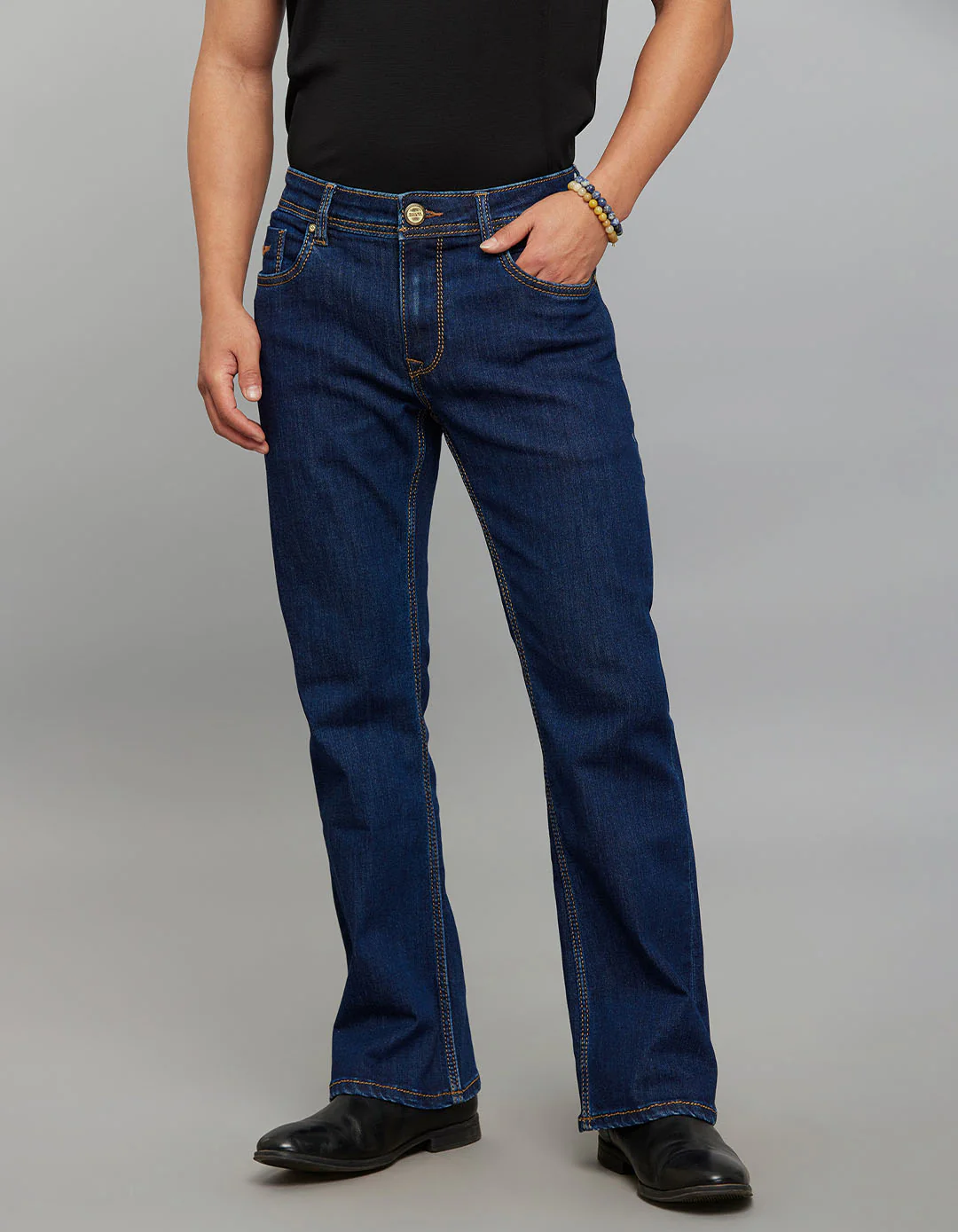 Dark Blue 5 Pocket Mid Rise Cropped length Loose Boot Leg Stretch Jeans