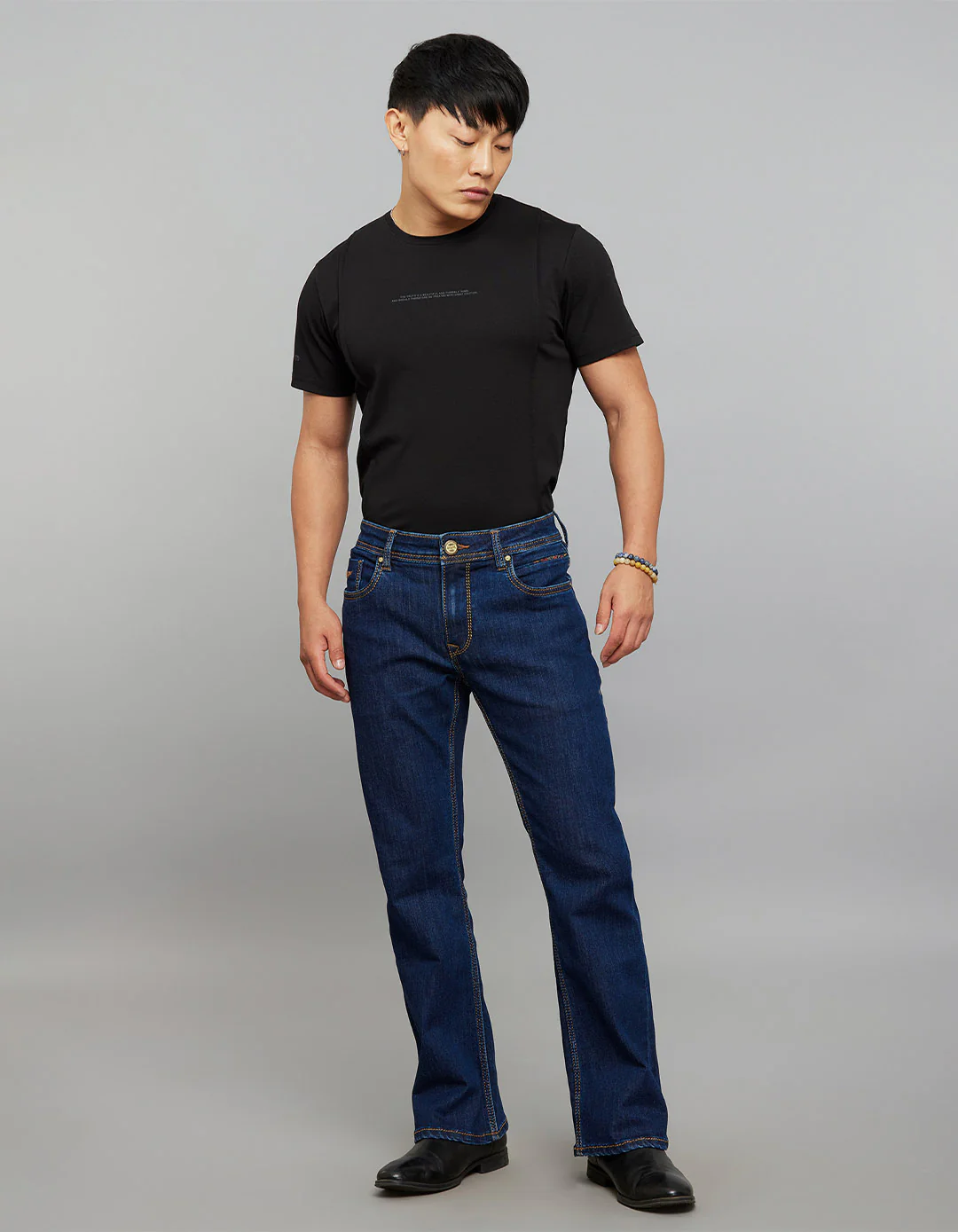 Dark Blue 5 Pocket Mid Rise Cropped length Loose Boot Leg Stretch Jeans - Image 2