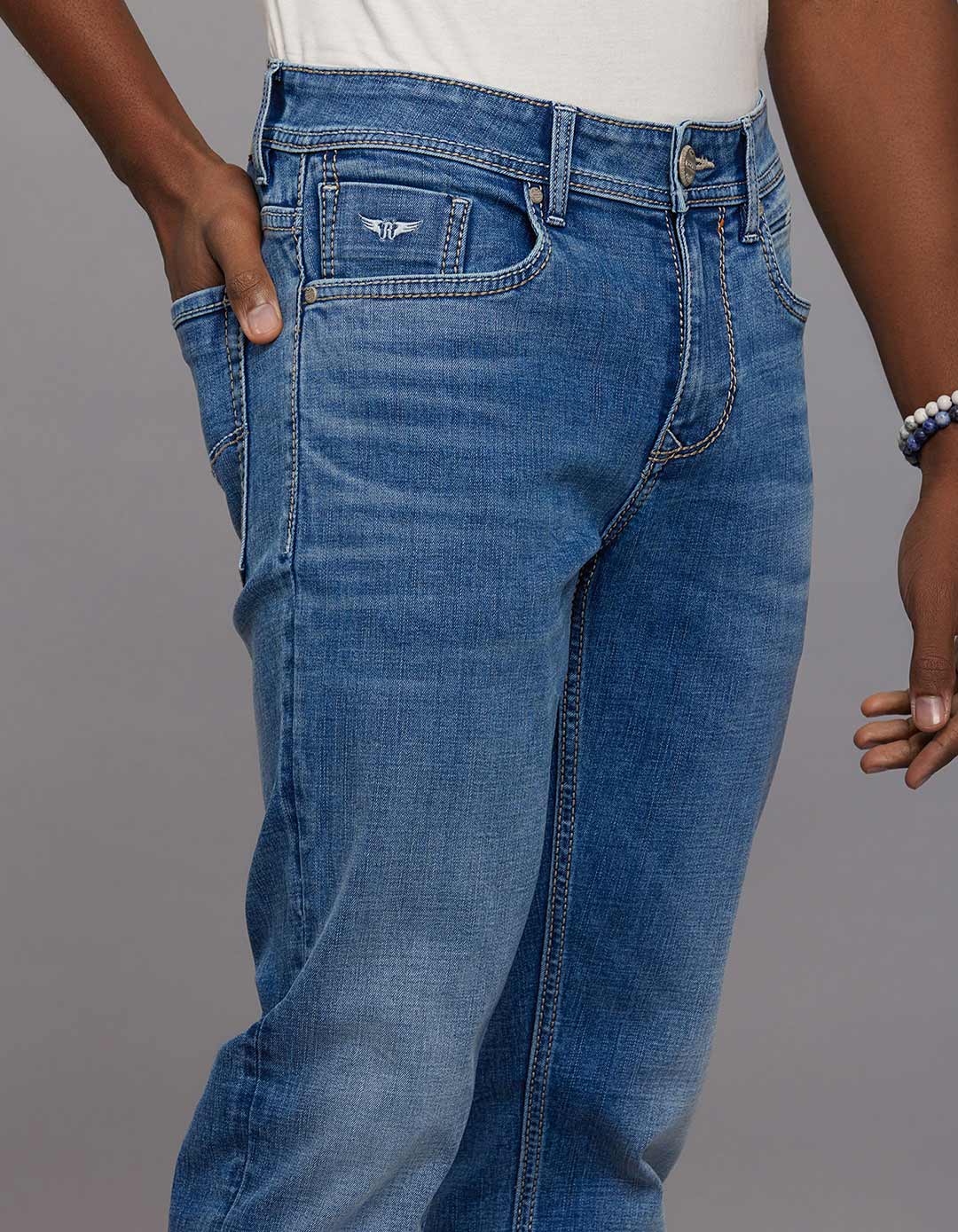 Medium Blue 5 Pocket Mid Rise Loose Boot Leg Stretch Jeans - Image 4
